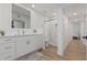 Bright bathroom featuring a marble shower and modern vanity at 13237 N 25Th Dr, Phoenix, AZ 85029