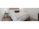 Cozy bedroom featuring a stylish bed with decorative pillows and lamps at 13237 N 25Th Dr, Phoenix, AZ 85029