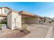 Charming home exterior featuring a carport and low-maintenance landscaping for a neat appearance at 13237 N 25Th Dr, Phoenix, AZ 85029