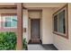 Inviting front entryway with a neutral-toned door and well-maintained exterior and landscaping at 13237 N 25Th Dr, Phoenix, AZ 85029