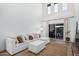 Bright living room with high ceilings, large windows, and a comfortable sectional sofa at 13237 N 25Th Dr, Phoenix, AZ 85029
