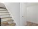 Stairway with wood stairs and mosaic tile riser at 13237 N 25Th Dr, Phoenix, AZ 85029