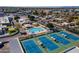 Community aerial featuring tennis courts, a pool, and a playground for outdoor recreation at 1331 W Baseline Rd # 360, Mesa, AZ 85202