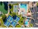 Overhead view showcasing community amenities, including tennis and basketball courts, pool, and parking at 1331 W Baseline Rd # 360, Mesa, AZ 85202