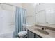 Clean bathroom featuring a toilet, shower/tub combo, and vanity sink at 1331 W Baseline Rd # 360, Mesa, AZ 85202