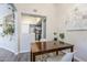 Dining area flows into kitchen with modern cabinets and stainless steel appliances at 1331 W Baseline Rd # 360, Mesa, AZ 85202
