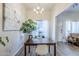Dining room with modern chandelier and views of front door and comfortable living area at 1331 W Baseline Rd # 360, Mesa, AZ 85202