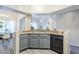 Contemporary kitchen with stainless steel sink and black dishwasher; large windows with natural light at 1331 W Baseline Rd # 360, Mesa, AZ 85202