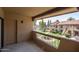 Relaxing balcony offers scenic views of the lush landscaping and nearby parking at 1351 N Pleasant Dr # 2011, Chandler, AZ 85225