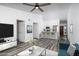 Open-concept living room showcases modern decor, breakfast bar, and sleek flooring at 1351 N Pleasant Dr # 2011, Chandler, AZ 85225