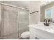 Bathroom features a tiled glass shower and modern finishes at 13805 N 31St Ave, Phoenix, AZ 85053