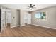 Bedroom with hardwood floors, ceiling fan, and closet at 13805 N 31St Ave, Phoenix, AZ 85053