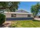 Well-kept home with a green lawn and mature landscaping, blending curb appeal and residential charm at 13805 N 31St Ave, Phoenix, AZ 85053
