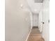 A hallway with wood-look floors at 13805 N 31St Ave, Phoenix, AZ 85053