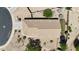 Aerial view of property showcasing the tiled roof, desert landscaping, and surrounding neighborhood at 14822 N Tonya Cir, El Mirage, AZ 85335