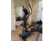 Exercise room with elliptical trainer and mirror, offering space for workouts and fitness activities at 178 W Pacific Dr, Casa Grande, AZ 85122