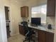 Bright office space with granite countertops, custom cabinets and a window offering natural light at 178 W Pacific Dr, Casa Grande, AZ 85122
