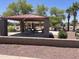 The community park features a shaded picnic area, benches, and mature trees at 178 W Pacific Dr, Casa Grande, AZ 85122