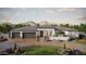 Stunning desert home with a three-car garage and professionally landscaped front yard at 1785 W Brooke Ln, Queen Creek, AZ 85144
