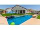 This backyard has a nice pool and an outdoor seating area at 1809 E Gwen St, Phoenix, AZ 85042