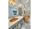 Elegant bathroom with copper tub, marble countertops, and modern fixtures at 1809 E Gwen St, Phoenix, AZ 85042