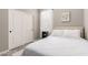 Cozy bedroom featuring a soft bed, storage closet, and natural light from the window at 1809 E Gwen St, Phoenix, AZ 85042