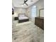 Cozy bedroom with neutral walls, hardwood floors, and a full-sized bed at 1809 E Gwen St, Phoenix, AZ 85042