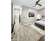 Neutral bedroom with an attached desk and a ceiling fan at 1809 E Gwen St, Phoenix, AZ 85042