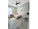 Spare bedroom featuring a full bed, closet, and a side table at 1809 E Gwen St, Phoenix, AZ 85042