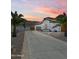 Stunning single-story home featuring a tile roof, desert landscaping, and a long driveway at 1809 E Gwen St, Phoenix, AZ 85042