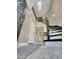 Bright foyer with beautiful wood flooring, stairs, and an elegant wrought iron banister at 1809 E Gwen St, Phoenix, AZ 85042