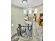Upstairs game room featuring fun decor, a spiral staircase, and a dazzling chandelier at 1809 E Gwen St, Phoenix, AZ 85042