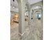 Hallway featuring a series of elegant archways leading to the living and dining rooms at 1809 E Gwen St, Phoenix, AZ 85042