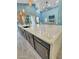 Open floor plan features granite countertops, a large island, and modern fixtures at 1809 E Gwen St, Phoenix, AZ 85042