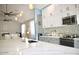 Modern kitchen with stainless steel appliances, granite counters, and sleek cabinets at 1809 E Gwen St, Phoenix, AZ 85042