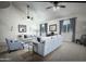 Bright and airy living room with neutral tones, ceiling fans, and ample natural light at 1809 E Gwen St, Phoenix, AZ 85042