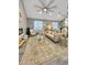 Inviting living room featuring plush seating, modern fireplace, and seamless flow to the dining area for easy entertaining at 1809 E Gwen St, Phoenix, AZ 85042