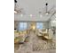 Open-concept design seamlessly connects the living, dining, and kitchen areas, creating a unified and stylish living space at 1809 E Gwen St, Phoenix, AZ 85042