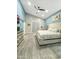 Stylish main bedroom with a king-size bed, vaulted ceiling, and modern decor at 1809 E Gwen St, Phoenix, AZ 85042