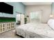 Comfortable main bedroom with TV and decorative touches at 1809 E Gwen St, Phoenix, AZ 85042