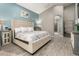 Comfortable main bedroom showcasing stylish decor, ensuite access, and neutral tones at 1809 E Gwen St, Phoenix, AZ 85042
