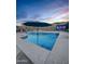 Backyard pool area with an outdoor TV on a wall at 1809 E Gwen St, Phoenix, AZ 85042