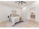 Serene bedroom featuring a comfortable bed and minimalist decor at 18812 N 90Th Pl, Scottsdale, AZ 85255
