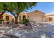 Charming single-story home with desert landscaping and a two-car garage at 18812 N 90Th Pl, Scottsdale, AZ 85255