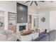 Stylish living room with elegant fireplace and comfortable seating at 18812 N 90Th Pl, Scottsdale, AZ 85255