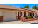 This single-story home boasts a two-car garage and landscaped front yard with brick accents at 2105 S Zinnia Ave # 468, Mesa, AZ 85209