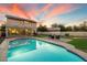 Backyard featuring a refreshing pool and cozy seating area at 21665 N 47Th Pl, Phoenix, AZ 85050