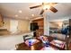 Cozy dining area with table set for dinner and a view of the kitchen and living room at 21665 N 47Th Pl, Phoenix, AZ 85050