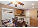 Cozy dining area with natural light, table set for dinner, and view of kitchen at 21665 N 47Th Pl, Phoenix, AZ 85050