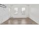 Bright bedroom with modern accents and multiple windows at 2402 E 5Th St # 1457, Tempe, AZ 85288